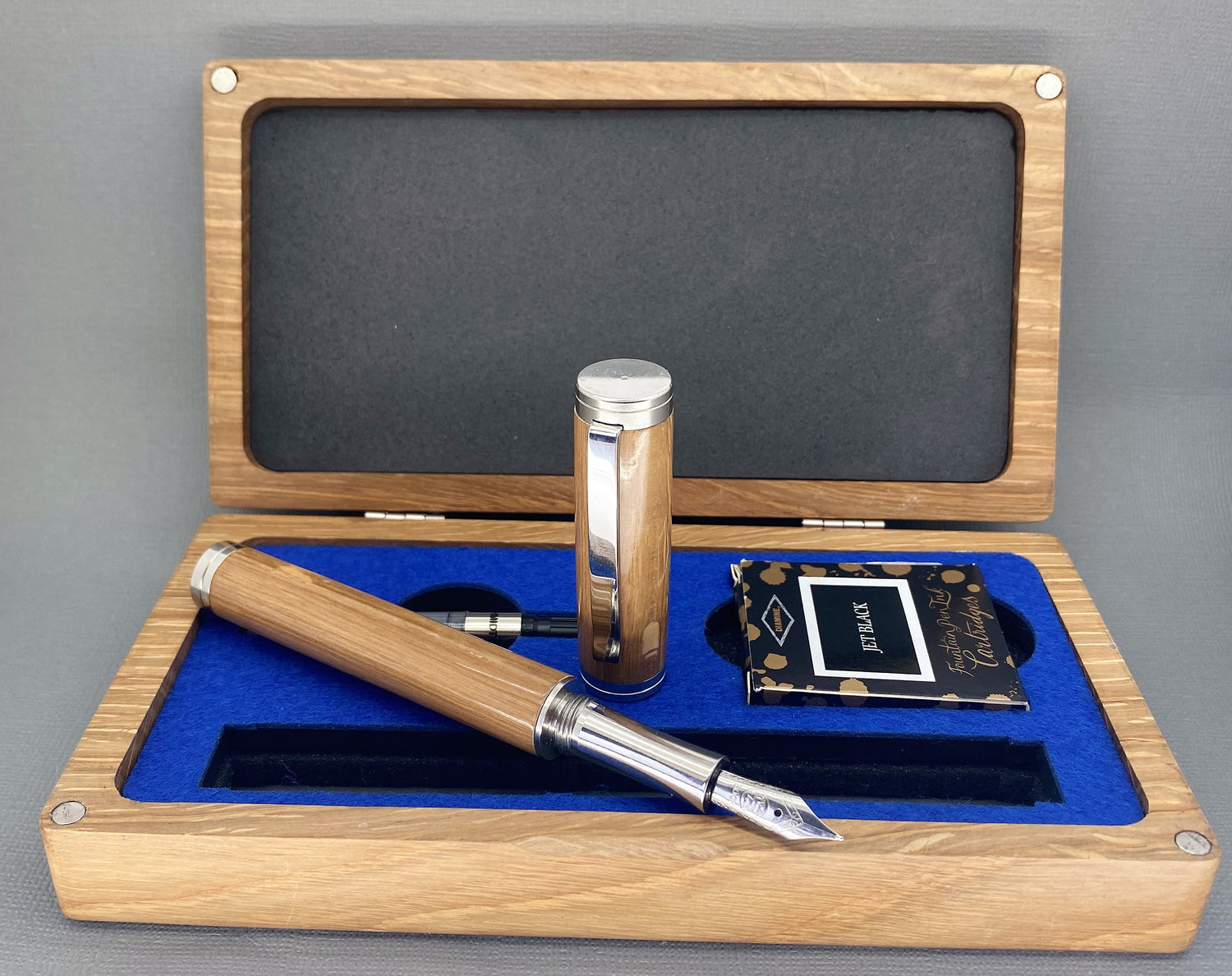 Stainless Steel all English pen set presented in a hand made English Oak wood presentation box