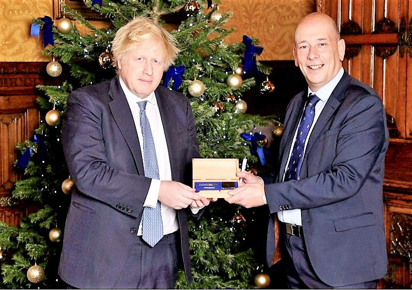 Boris Johnson being presented with a special handmade presentation box