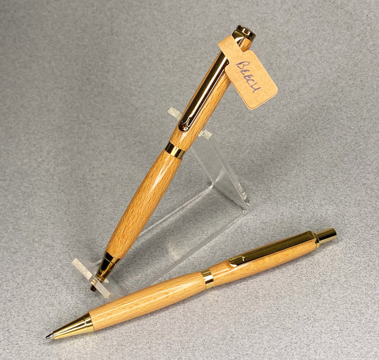 One pen and one propel action pencil, in Beech wood and gold plated fittings