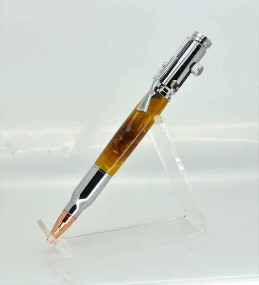 A clear acrylic base holding a handturned Orange acrylic Bolt action pen