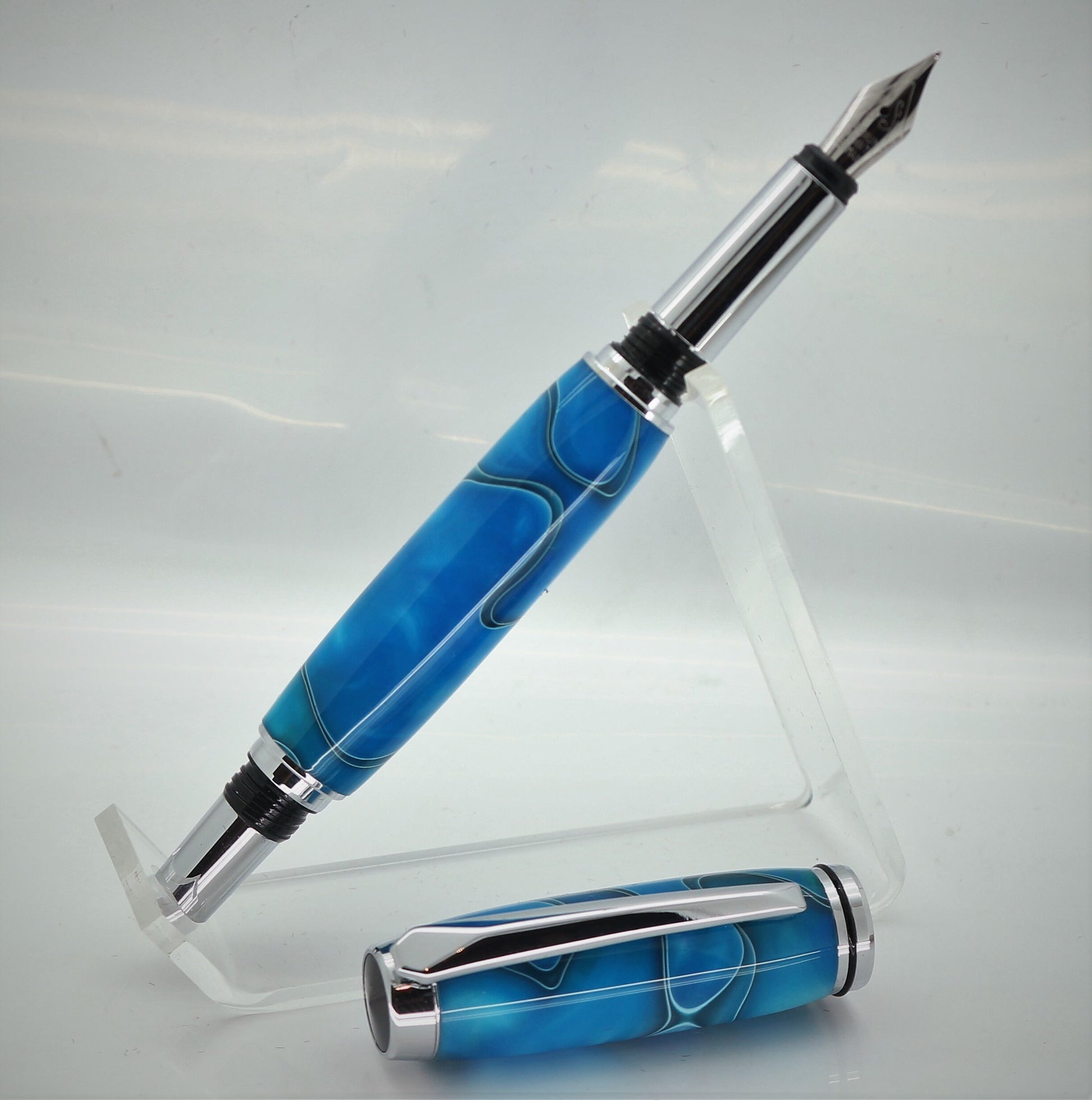 Blue Acrylic Fountain pen the pen has chrome plated fittings